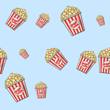 Seamless vector style popcorn pattern with red striped cinema buckets scattered on a light blue background. Ideal for wrapping paper, fabric, wallpaper, packaging, and movie themed designs.