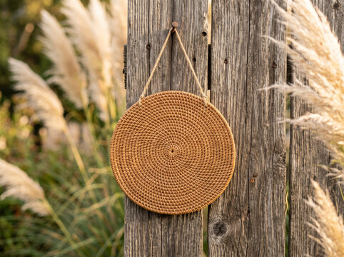 Round Woven Rattan Straw Bag Mockup Rustic Wood Fence