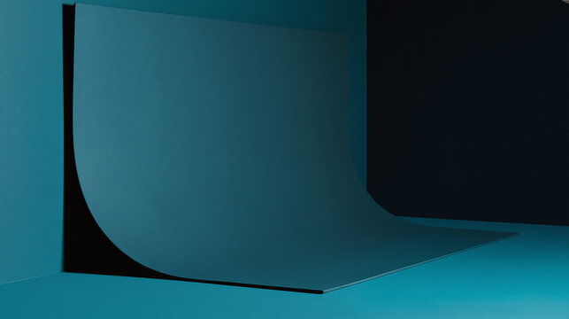 Minimal product photography studio deep petrol teal curved backdrop with dramatic shadow and smooth paper surface creating moody still life scene