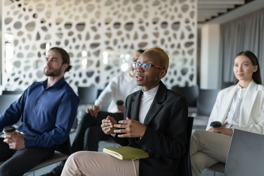 Black businesswoman speaking during seminar