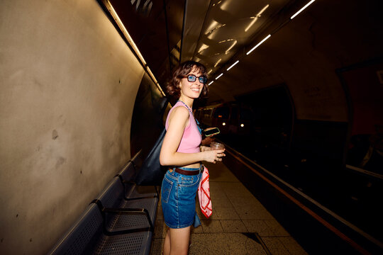 Attractive woman wait for a subway train