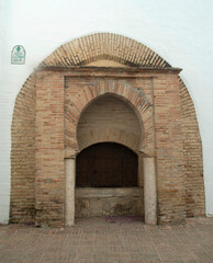 Fototapeta premium 13th century Aljibe de San Miguel Moorish water cistern portal in Albayzin, Granada Andalusia, Spain