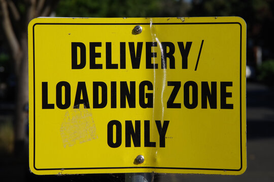 DELIVERY LOADING ZONE ONLY sign