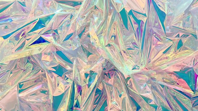Iridescent holographic foil surface with sparkling rainbow crystal like texture pattern