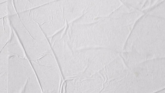 Abstract crumpled paper texture background with soft lighting. Minimal clean surface for design, presentations, typography, overlay and motion graphics. Seamless looping 4k