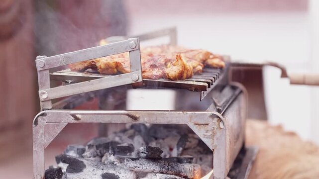 Side View Profile of Checking Grilled Meat Doneness and Placing Back on Barbecue Grill over Charcoal