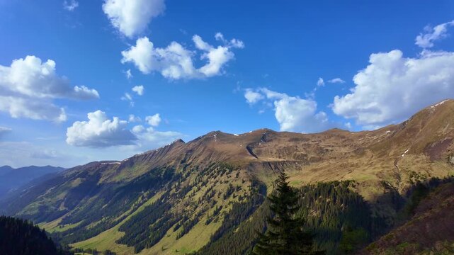 Mountain aerial landscape valley. Mountainous landscape with cloudy sky. Scenic green hill. Alpine scenery. Panorama mountain landscape. Nature scenery and mountain landscape