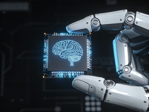 A robotic hand holding a computer processor chip that features a glowing blue circuit board brain.