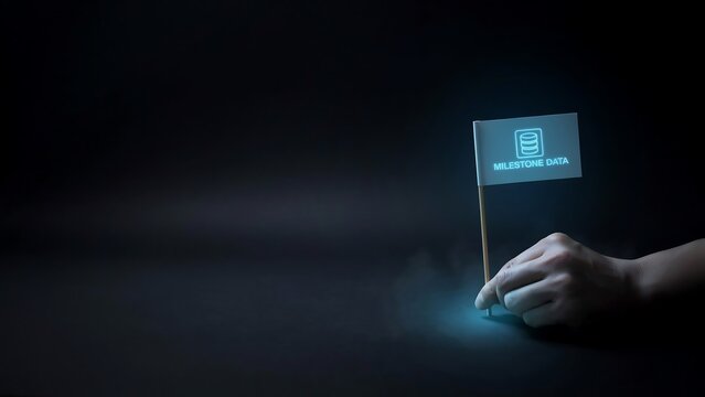 Human hand placing glowing milestone data flag symbolizing digital achievement