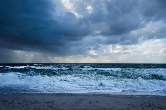 A beach on the North Sea island of Sylt with high waves following a storm.