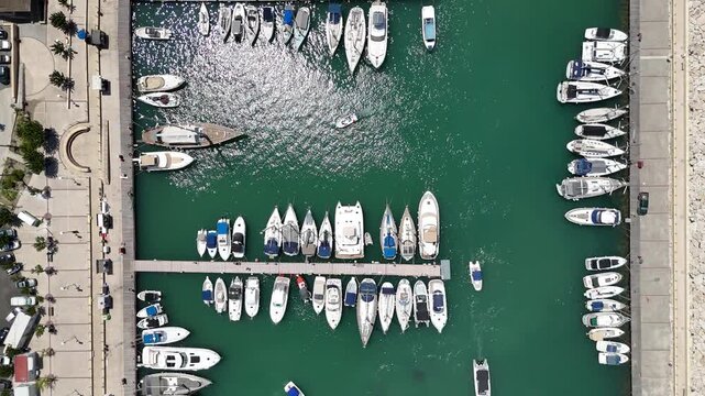 Top Down Aerial View of Latchi Harbour in Cyprus with Sailboats and Ships