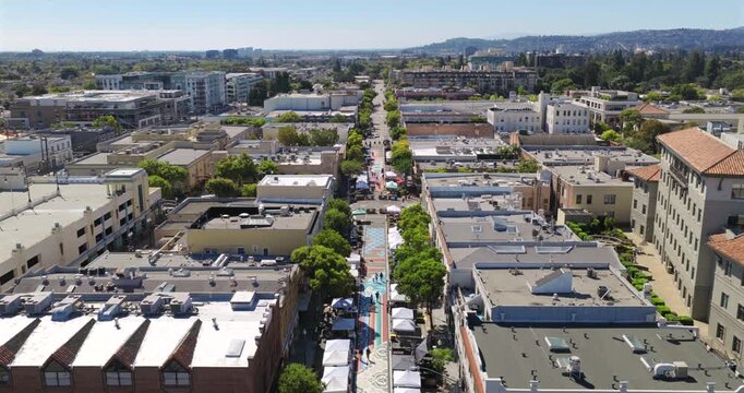 San Mateo California - Aerial View of Downtown Facing South with Closed off Streets and Pedestrians Walking around Shops and Restaurants in Daytime