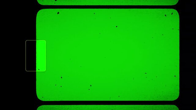 Old shaking film frame animation, dark and flickering dirty green screen