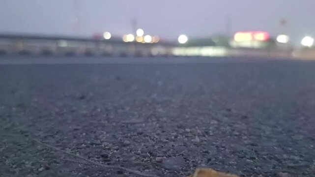 Low Angle View of Fast Moving Traffic Vehicles on Indian Highway Road Asphalt Surface Close Up