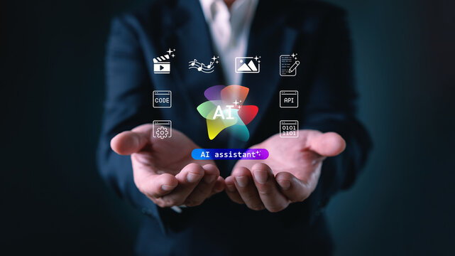 Businessman cupping hands presents a colorful ai assistant icon surrounded by digital content generation and programming symbols for innovative smart workspace technology solutions.
