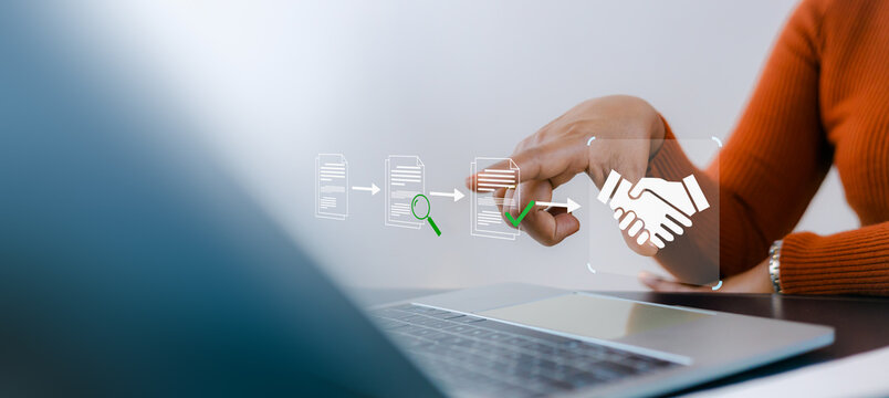 Person using laptop with digital icons showing document review process leading to handshake agreement illustration