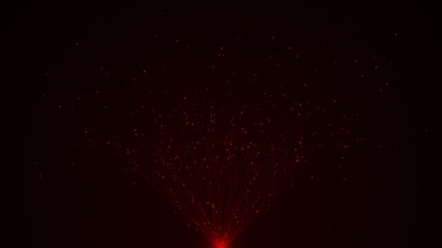 Glowing red dust particles bursting from bottom on dark background