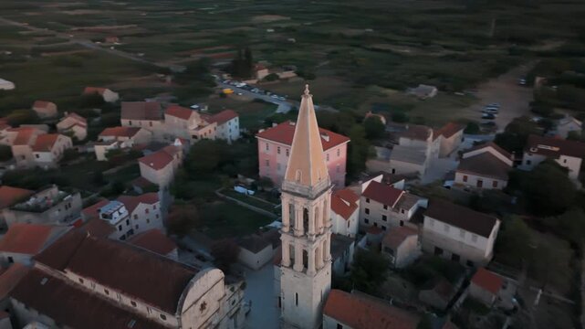 Aerial Stari Grad Church Bell Tower Sunset Over Bay Hvar Croatia