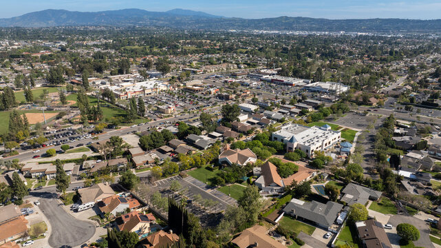 Afternoon aerial view of the downtown commerical district and surrounding neighborhood of Yorba Linda, California, USA.