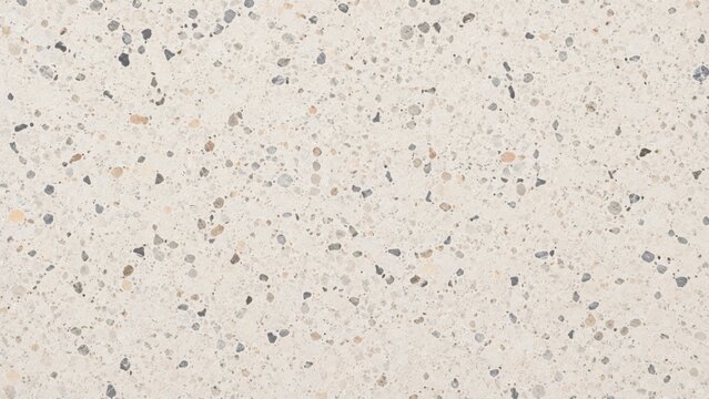 A high resolution close up of light beige terrazzo flooring with small stone chips