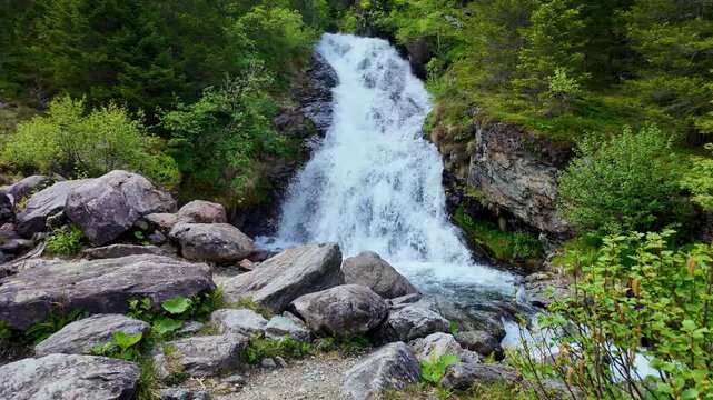 Scenery waterfall route. Nature mountain landscape. Waterfall landscape. Nature wildness. Rapid waterfall travel destination. Picturesque waterfall. Travel destination