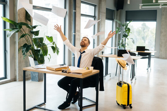 Businessman celebrating freedom from work, enjoying vacation anticipation
