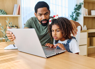 Obraz premium Father and daughter doing homework with laptop at home. Father and teenage girl happy using laptop. Teen girl and dad sitting at home working with notebook