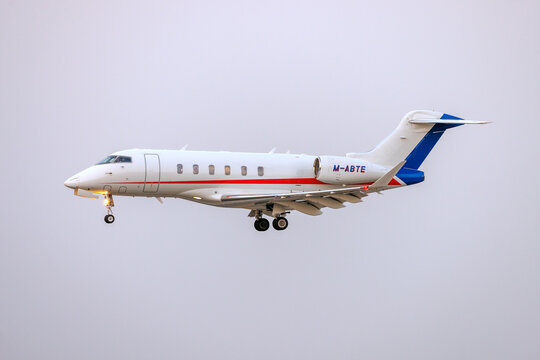 Luqa, Malta - July 18, 2026: Ryanair owned Bombardier Challenger 3500 (BD-100-1A10) (REG: M-ABTE) landing in low light.