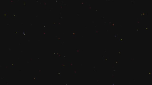 Abstract dark background with small white dots and particles.