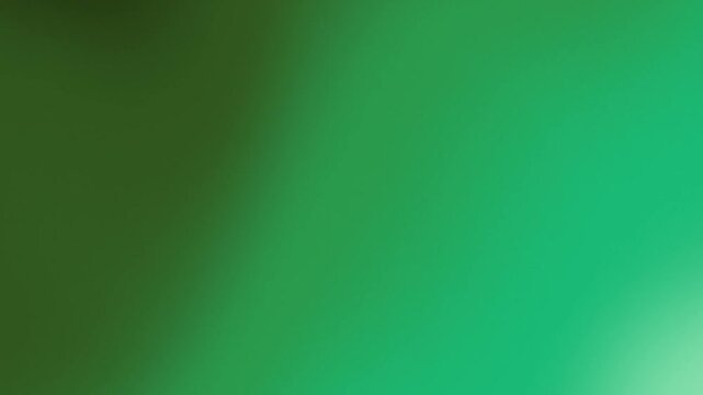 Abstract green pixelated background with smooth gradient transition.