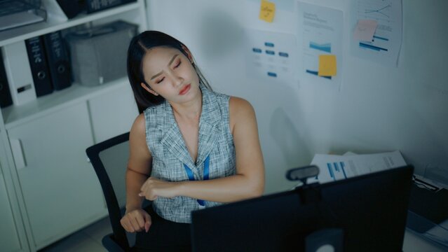 Office, stretch, and relax scene featuring relaxing and stretching in a contemporary setting, syndrome, overtime, pain, office syndrome, disease, worker, work, working, night, night time.