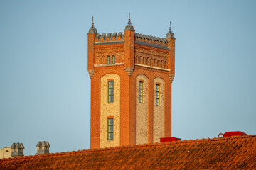 Crenellated Red Brick Water Tower Above Tiled Rooftops In Kalmar Sweden © Birute Vijeikiene