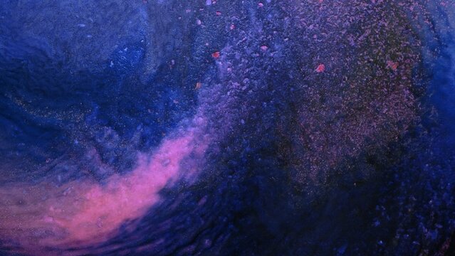 Mixing colorful alcohol ink fragments in creative art space