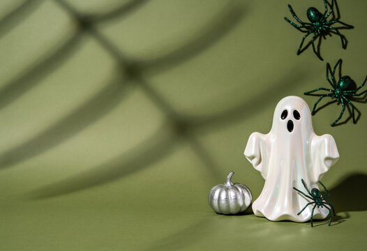 Halloween ghost, ceramic figurine, ghost figurine, gold spiders, silver leaves, autumn decor, spooky holiday, top view, spook season, ceramic ghost, party ornament, dark green, halloween decor, season