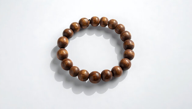 Isolated wooden bead bracelet, mala prayer beads for meditation and yoga, natural earth tones, spiritual accessory
