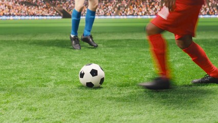 Obraz premium A red soccer player falls to the grass in pain after a dangerous tackle as teammates protest and demand a foul sanction, creating a dramatic injury moment while the footballer rolls on the pitch.