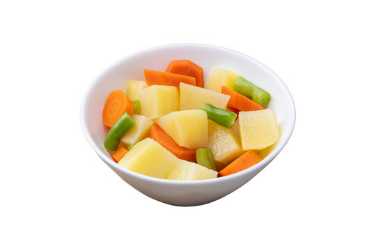Cooked vegetables in a bowl isolated over white background