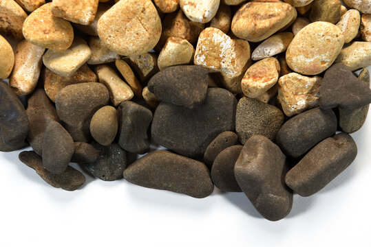 Multicolored stones isolated on white background	
