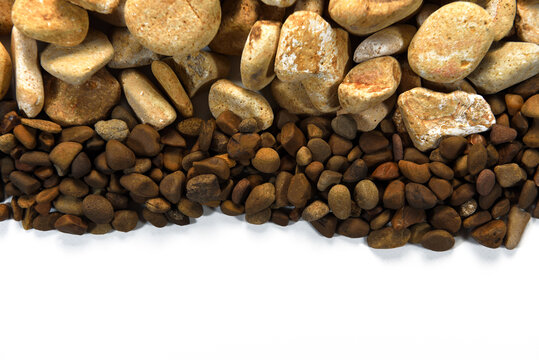 Multicolored stones isolated on white background	

