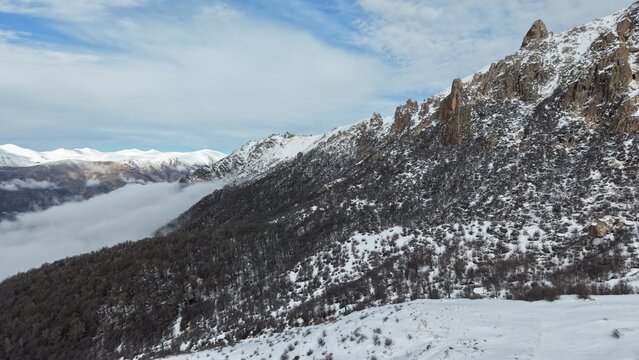 snow-covered mountains, 2,000 meters above sea level