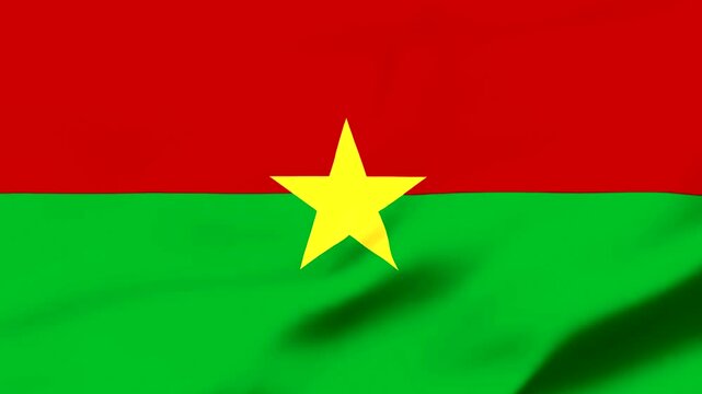 Burkina Faso flag waving with yellow star on red and green background