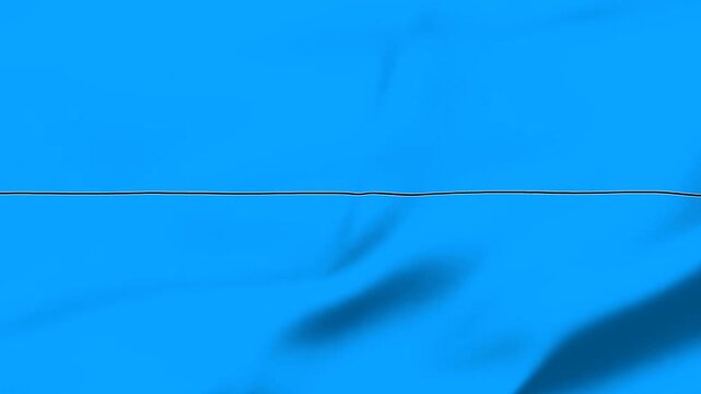 Closeup view of a thin line on a blue fabric background