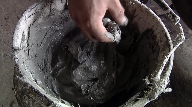 Artisan Hand Scooping Fine Clay Paste for Bell Mold Coating - 4K