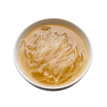 A delicate bowl of clear noodle soup, showcasing translucent noodles submerged in a savory broth, presented from a top-down perspective.