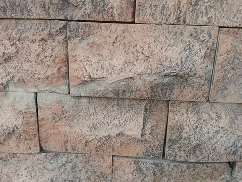 Rectangular stone wall texture relief, 3D background for rendering and materials, aesthetic and vintage wallpaper.