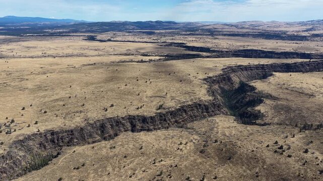 Over millennia Mill Creek has carved a 230-foot deep canyon on the Central Oregon plateau between Bend and Portland. This scenic area of high desert is part of the Warm Springs reservation.