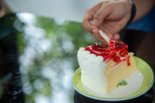 Woman cake happy relax eat sweets slice of cake. Women enjoy eating cupcake joyful lifestyle. Pastry sugar dessert sweet bakery ready-to-eat. Woman hand use spoon tasting gourmet baked dessert