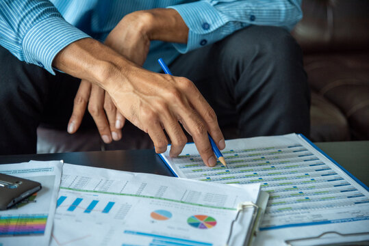 Banner man Hands writing planning notebook. Banner Businessman hand using pen signing new contract starting projects in conference room. Close up male hand holding pen write on diary sketchbook