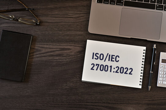 ISO IEC 27001:2022 Security Standard Reference on Professional Desk Setup &mdash; ideal for IT security and compliance articles