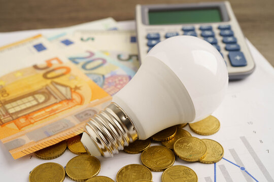 Cost of electric utilities with light bulb for payment.